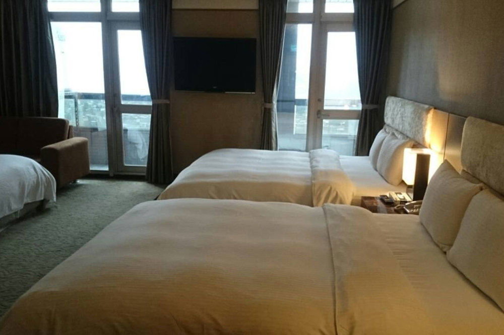 Rhine Inn Цзилун Экстерьер фото